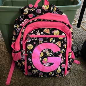 Justice emoji initial G backpack